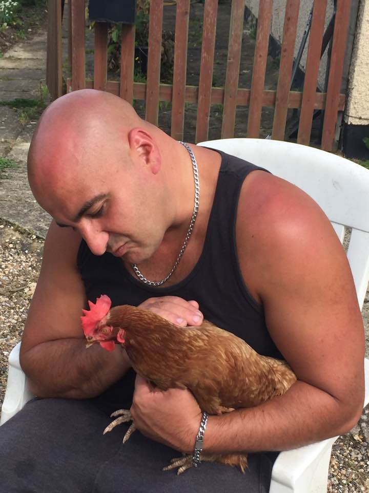 man with chicken